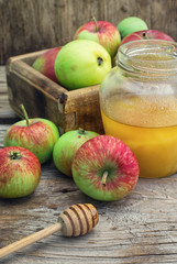 Summer still life of apples and honey