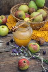 Summer still life of apples and honey