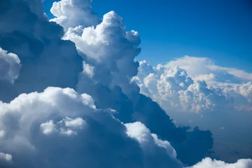 Fotobehang Hal Luchtfoto van lucht en close-up wolken