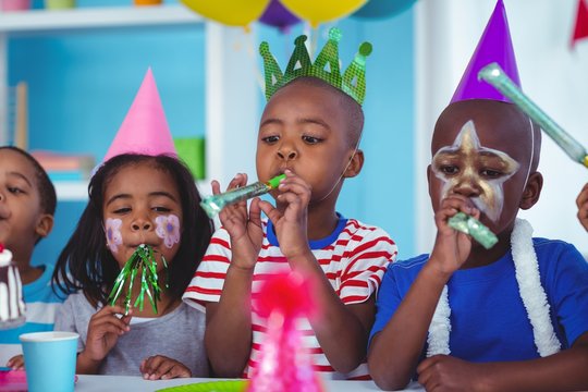 Happy kids celebrating a birthday