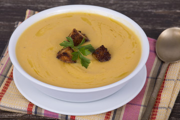Apple pumpkin cream soup in a dish