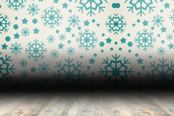 Snowflake wallpaper over floor boards