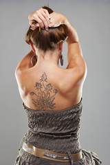 Tattoo woman portrait in studio shoot