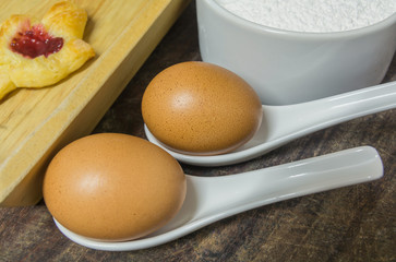 bakery main ingredients with berry jams bread