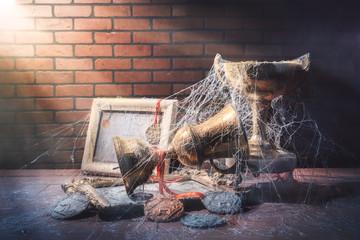High contrast image of dusty trophies with cobwebs representing