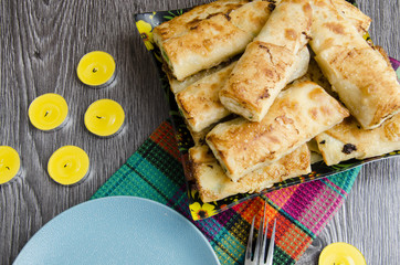 Fried rolls of pita with cheese