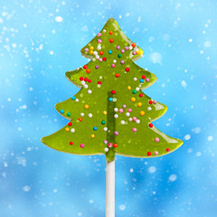 Sweet Christmas tree on a blue background.