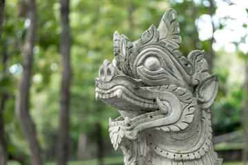 An old sculpture in the park of Thal university