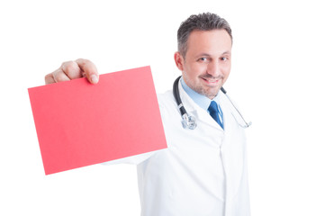 Doctor or medic holding red blank paper with copy space