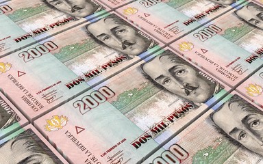Fototapeta na wymiar Colombian pesos bills stacks background. Computer generated 3D photo rendering.