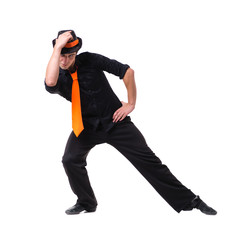 Disco dancer showing some movements against isolated white