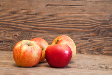 apples on a wooden background