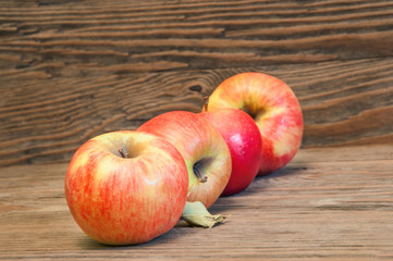 apples on a wooden background