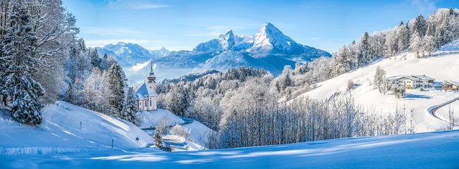 Wall murals Blue sky Idyllic winter landscape with chapel in the Alps, Berchtesgadener Land, Bavaria, Germany