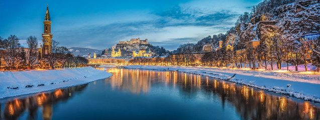 Naklejka premium Historic city of Salzburg in winter at dusk, Austria