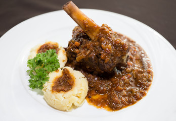 Grilled lamb steak with spicy chili sauce.