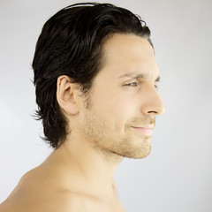 Obraz premium Profile of a handsome man smiling