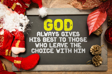 Blackboard with the text: God Always Gives His Best to Those Who Leave The Choice With Him in a...