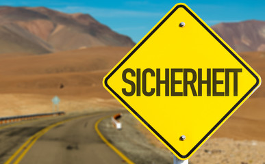 Safety (in German) sign on desert road