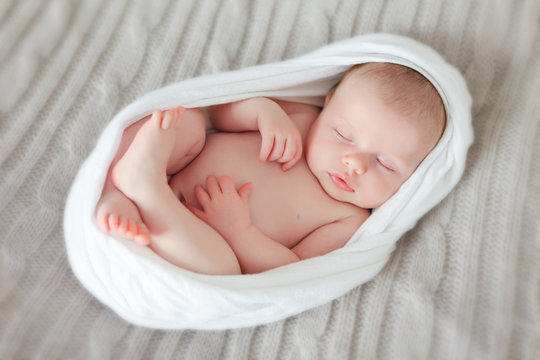 sleeping newborn baby