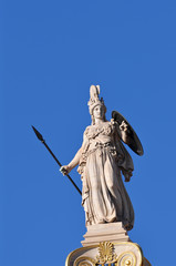 Statue of Athena on top of a pillar in front Academy of Athens, Greece