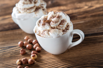 Cup Of Cappuccino With Whipeed Cream Over Wooden Table, Coffee