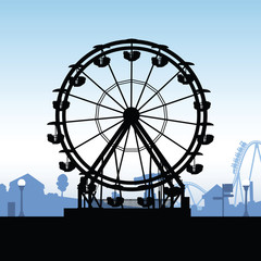 Silhouette illustration of a ferris wheel at an outdoor carnival.