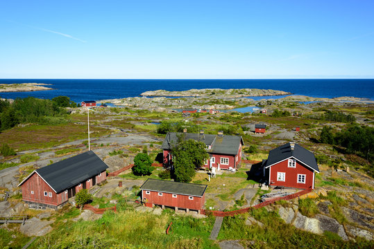 Group of old red houses in the archipelago