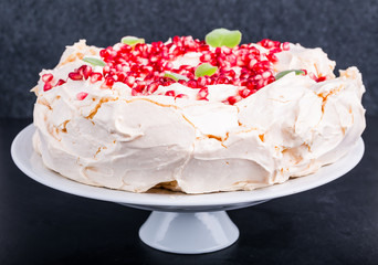 Pavlova cake with pomegranate