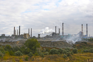 Ukraine, Dneprodzerzhinsk, city dump on the background of plants