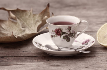 Tee in an old stylish cup. I used filter to streanghten the romantic feelings.
