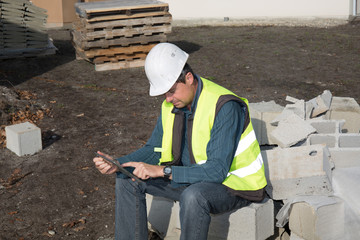 Architect using electronic tablet