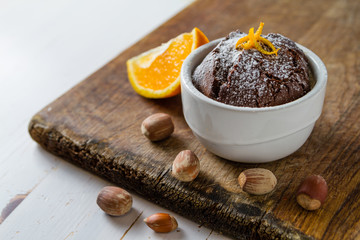 Chocolate and orange cupcake with coffee
