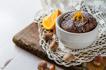 Chocolate and orange cupcake with coffee
