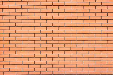 Wall of a new orange brick
