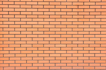 Wall of a new orange brick