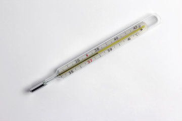 medical thermometer closeup on white background