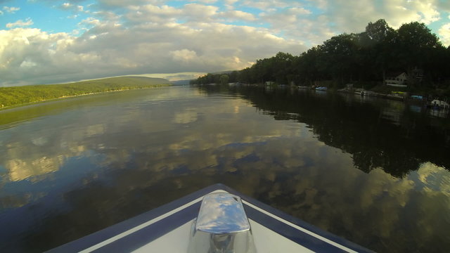 Boating Bow Time Lapse. bow of a boat perspective time lapse riding around a lake during sunset
