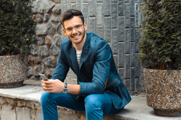 Concept for stylish young man outdoors