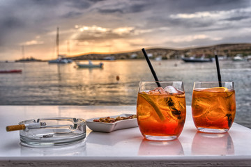 Drink on the waterfront at sunset
