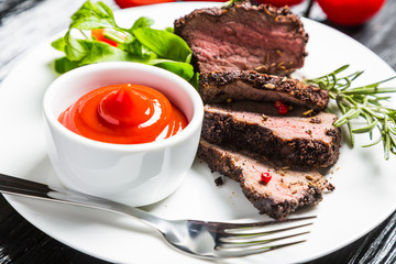 Steak with vegetables and sauce