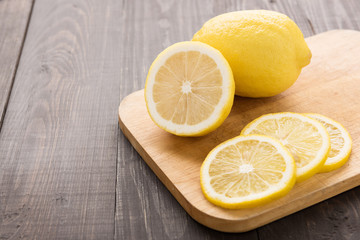Fresh slice lemon on the wooden table