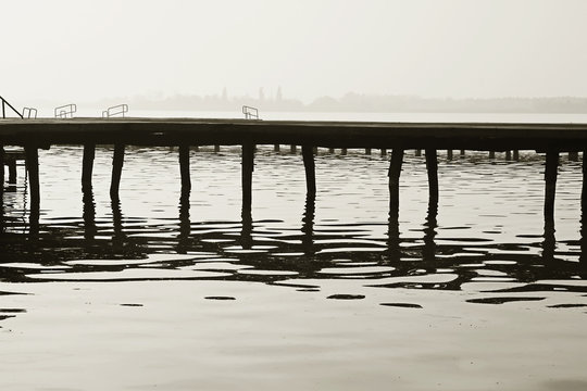 Old wooden dock . Fine art  black and whie image