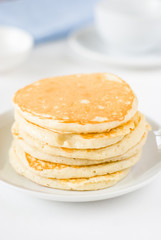 Fototapeta na wymiar Stack of small pancakes