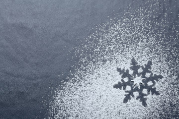 Snowflake ornament on blackboard