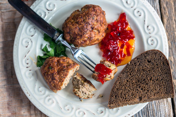 Turkey cutlets with sweet pepper jam closeup.