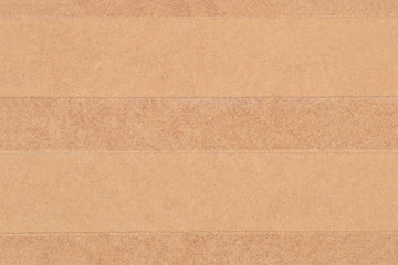 Chipboard background from old processing trash paper and wood
