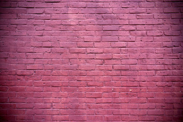 Hintergrund rot gestrichene Backsteinwand mit Fehlstellen