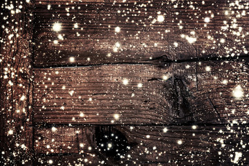 Dark Brown Wood Texture With White Snow And Stars In Vintage Style . Christmas Background. Christmas