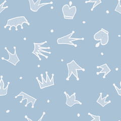 Cute hand drawn blue seamless pattern with crowns for little prince. Can be used to design children's clothing, birthday invitation. Vector illustration.
